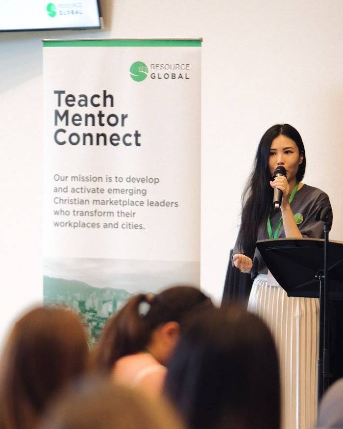 Event photographer capturing a speaker at the Resource Global Teach Mentor Connect event in Penang