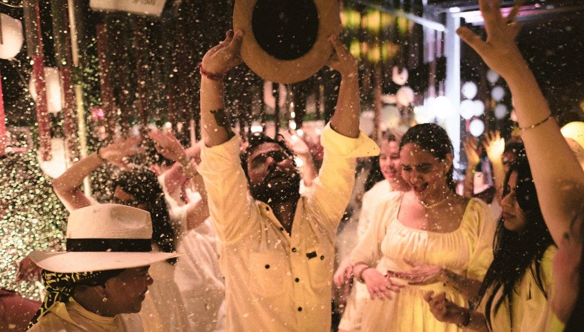 Guests dancing and celebrating at a festive night event in Penang