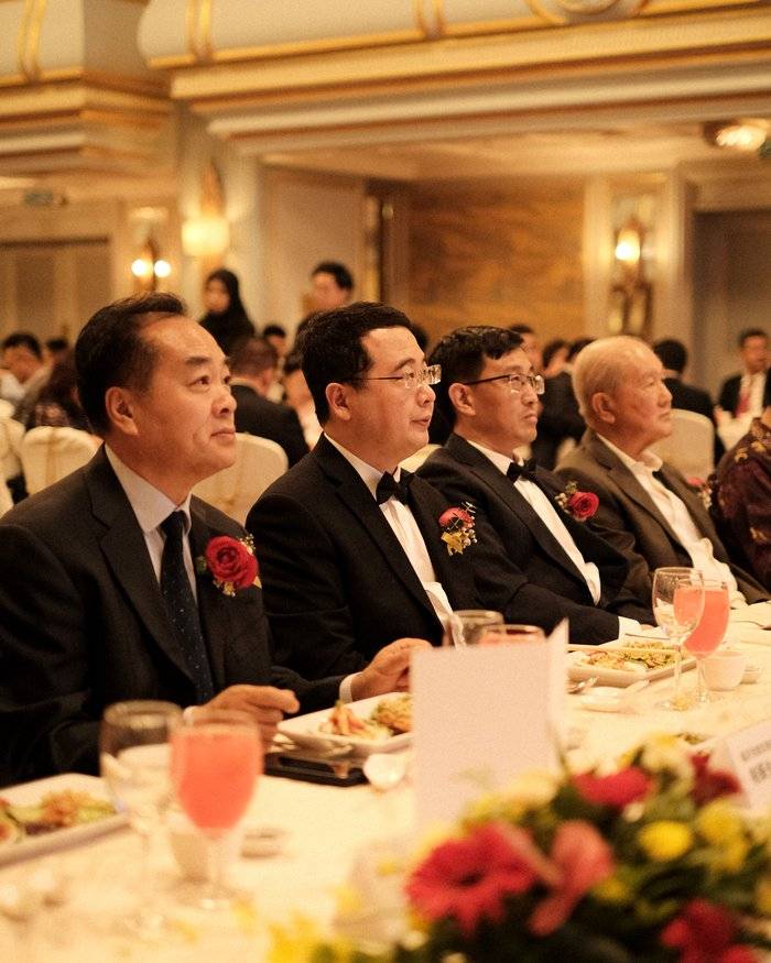 Penang event photographer capturing guests at a formal corporate gala dinner